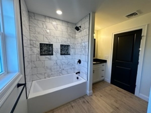 1479 Main Street Acushnet, MA 02743 - Photo 10 of 23 a bathroom with a bathtub and a shower