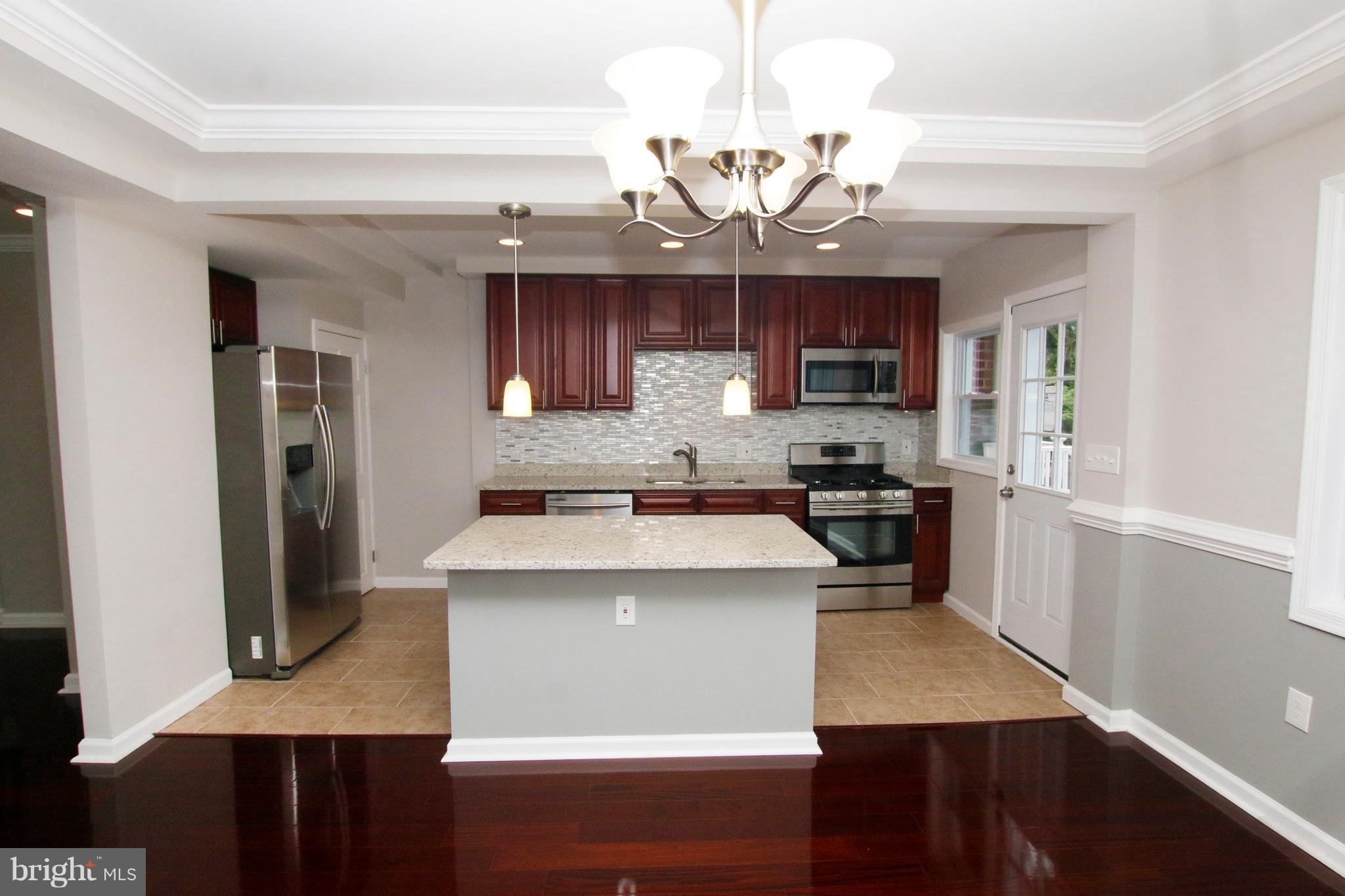 1220 Ramblewood Road Baltimore, MD 21239 - Photo 11 of 30 Kitchen Island