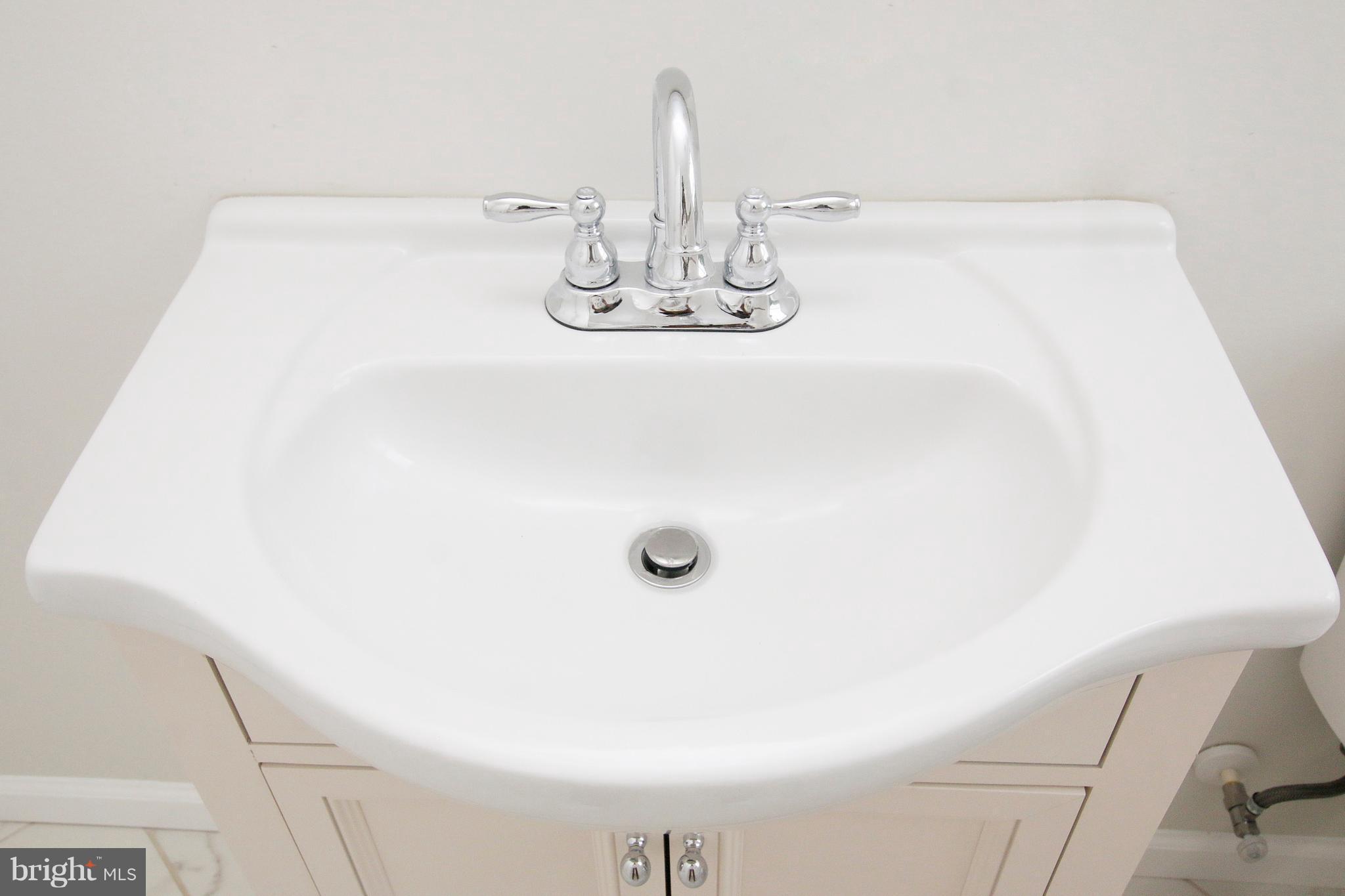 1220 Ramblewood Road Baltimore, MD 21239 - Photo 22 of 30 Bath vanity