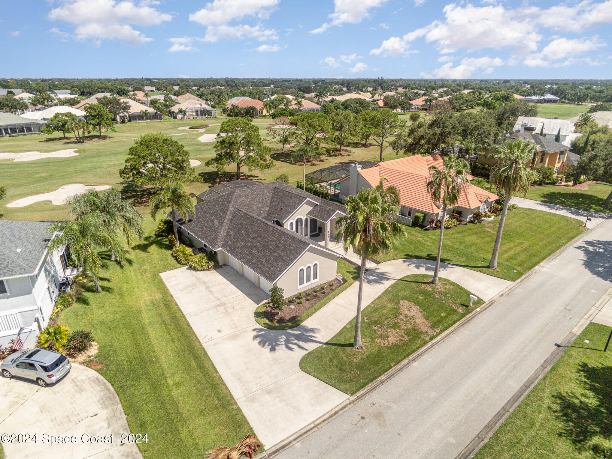 697 Spring Lake Drive Melbourne, FL 32940 - Photo 3 of 51 an aerial view of a house with a ocean view