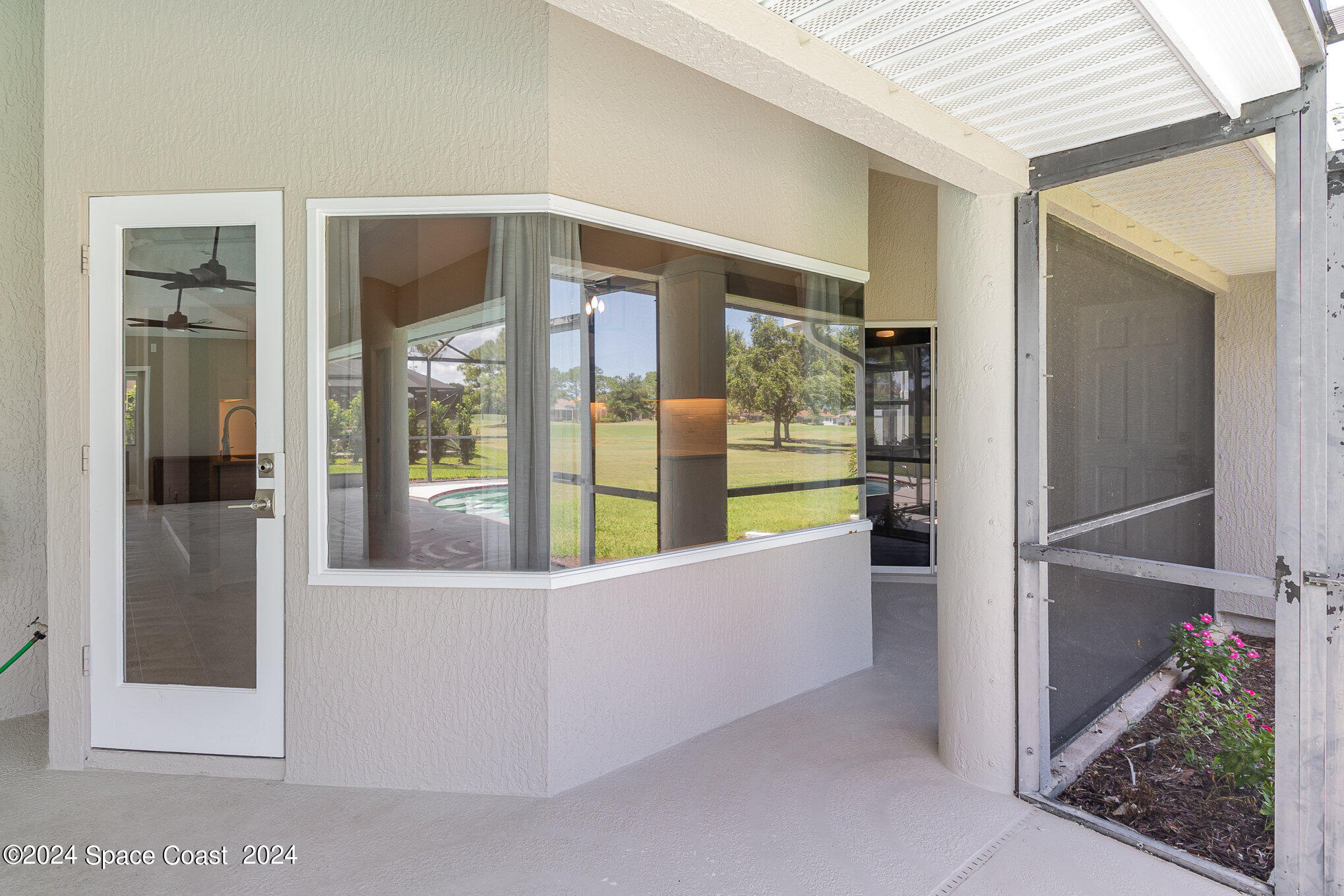 697 Spring Lake Drive Melbourne, FL 32940 - Photo 33 of 51 a view of an entryway of the house