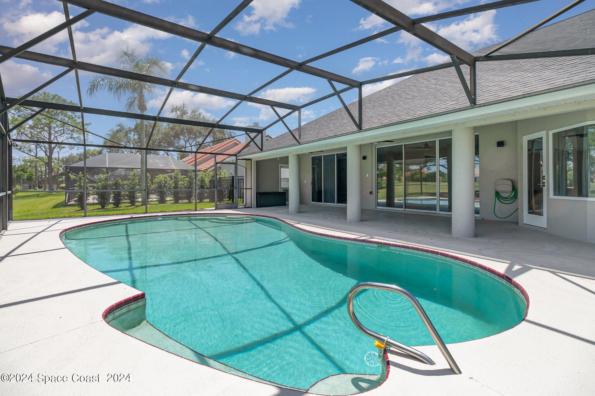697 Spring Lake Drive Melbourne, FL 32940 - Photo 34 of 51 Screen enclosed pool