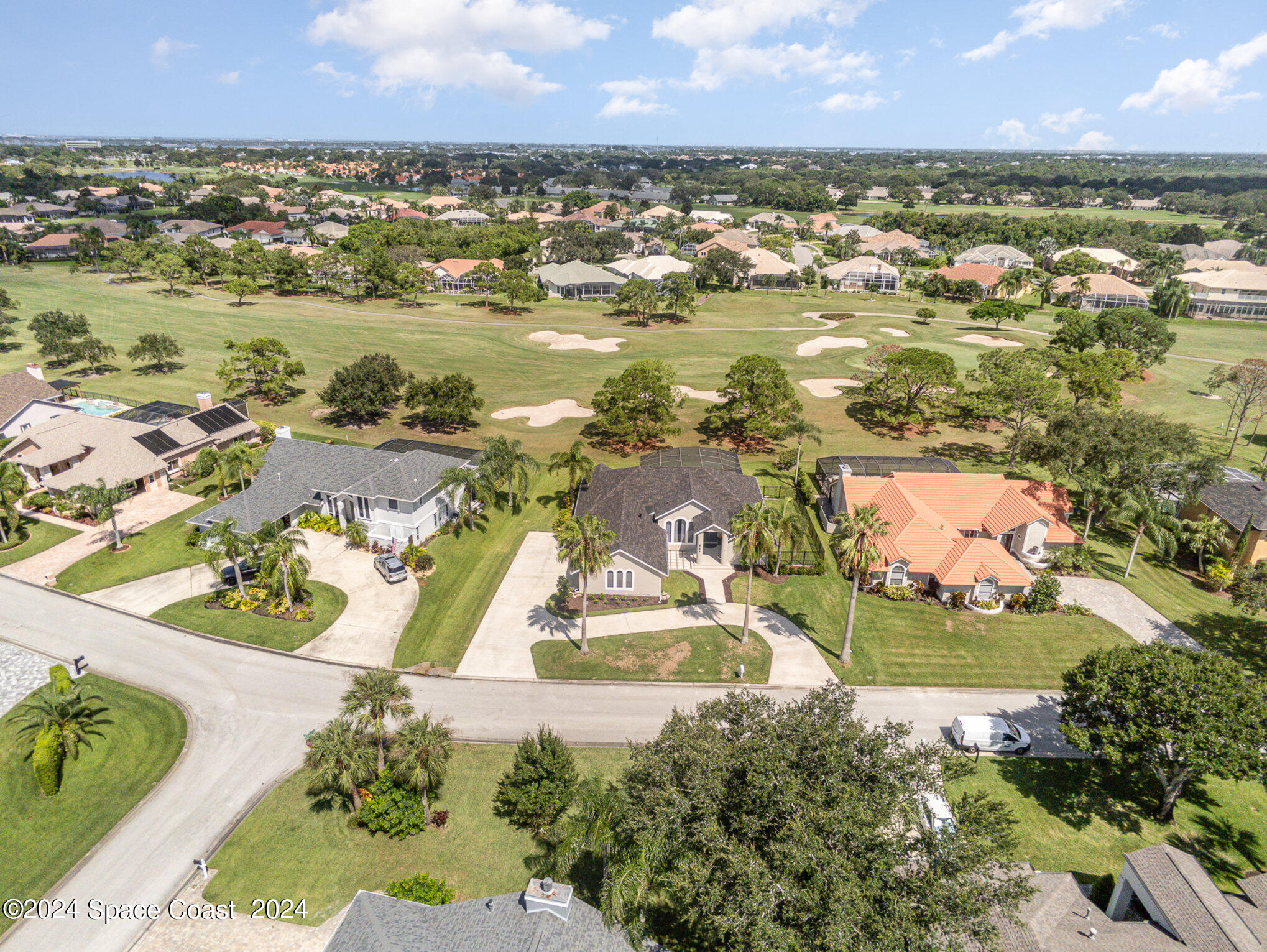 697 Spring Lake Drive Melbourne, FL 32940 - Photo 43 of 51 an aerial view of residential houses with outdoor space