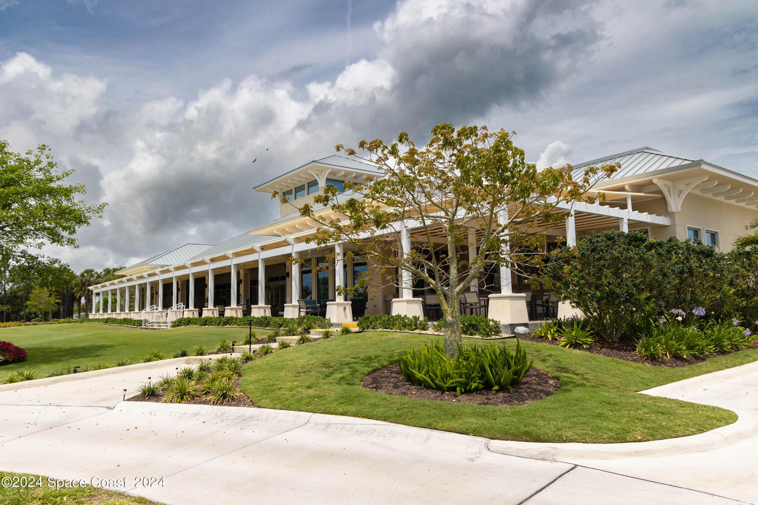 697 Spring Lake Drive Melbourne, FL 32940 - Photo 47 of 51 front view of house with a yard