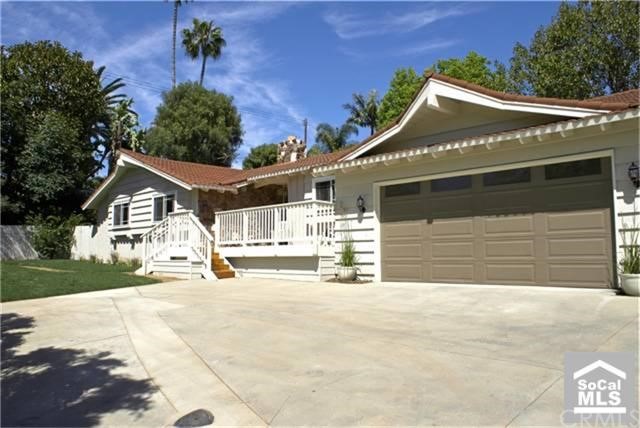 1362 Bexley Lane Brea, CA 92821 - Photo 1 of 1 a front view of a house with a yard and garage