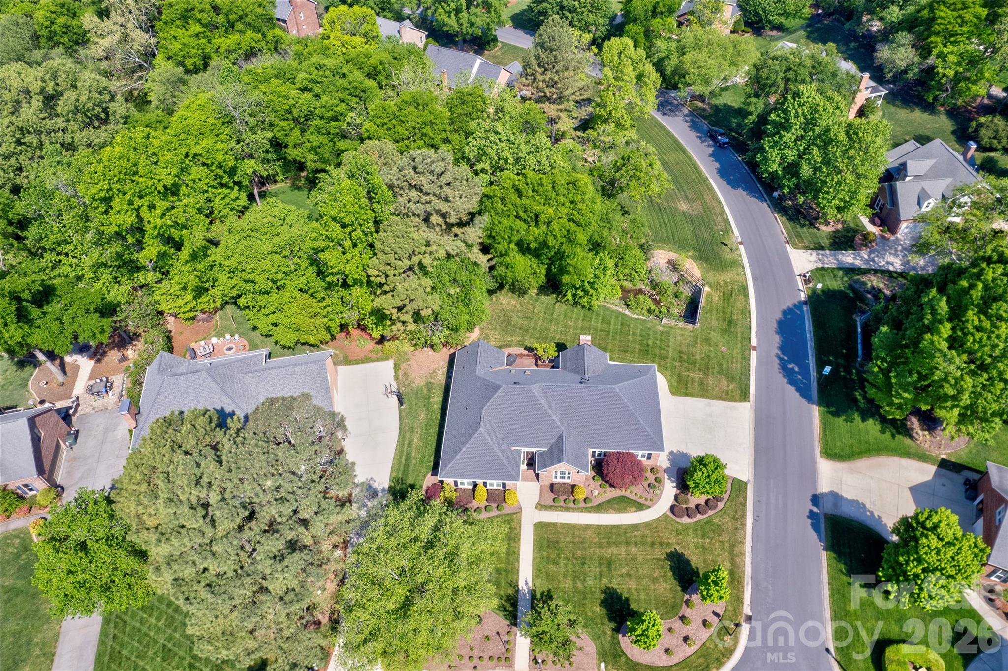 1188 Fawn Ridge Road Northwest Concord, NC 28027 - Photo 37 of 38 an aerial view of residential house with outdoor space and trees all around