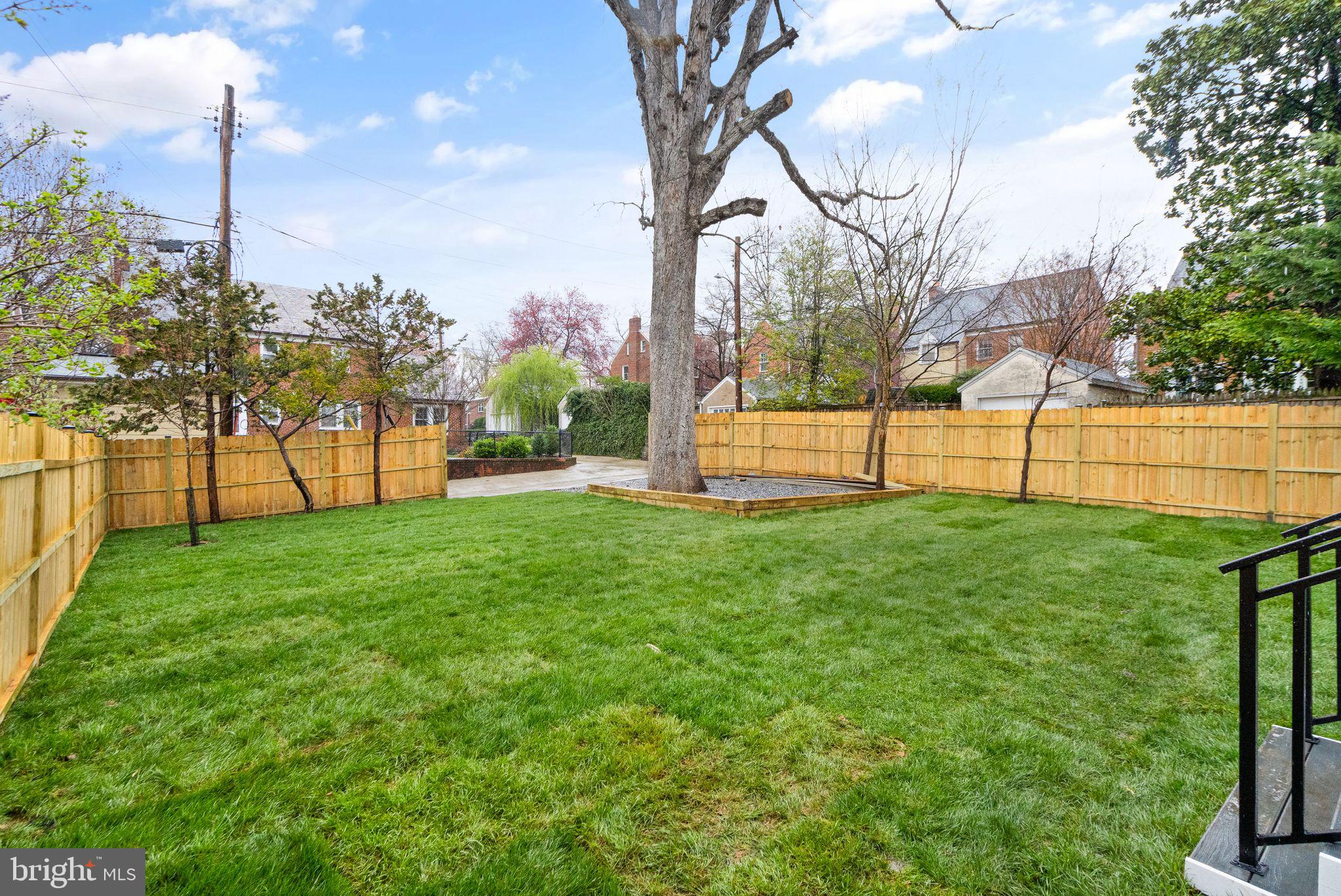 4611 Yuma Street Northwest Washington, DC 20016 - Photo 27 of 32 and a sizable backyard for Fido