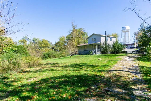 a view of a bench in a yard