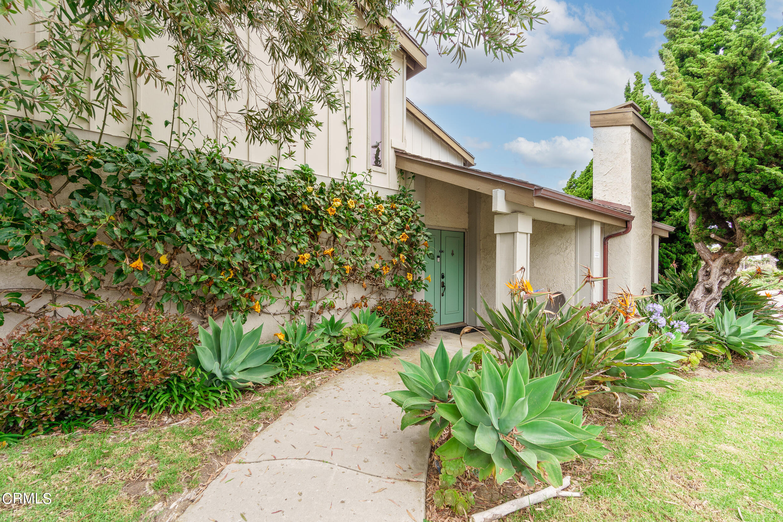 3225 Harbor Boulevard Oxnard, CA 93035 - Photo 2 of 34 a backyard of a house with lots of green space