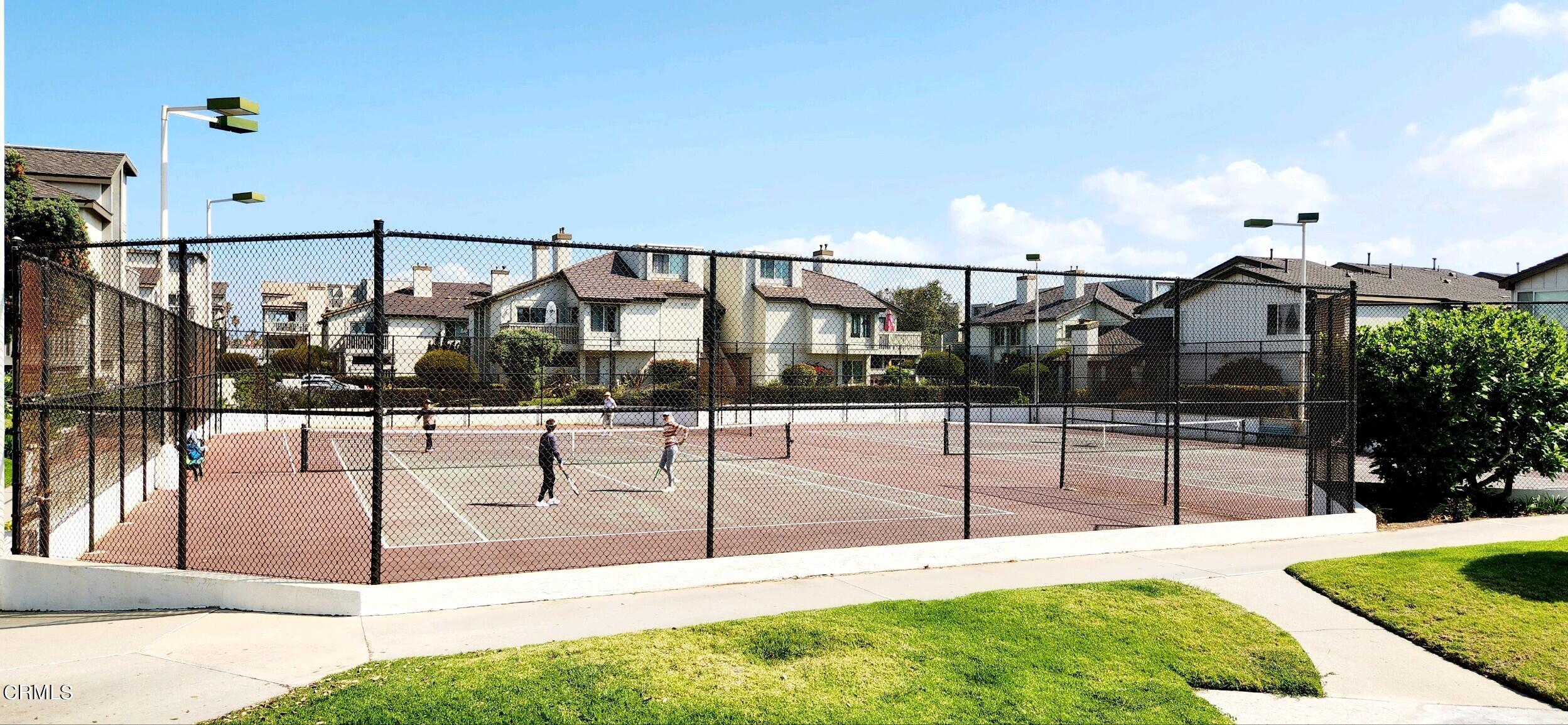 3225 Harbor Boulevard Oxnard, CA 93035 - Photo 25 of 34 a view of a swimming pool with a patio