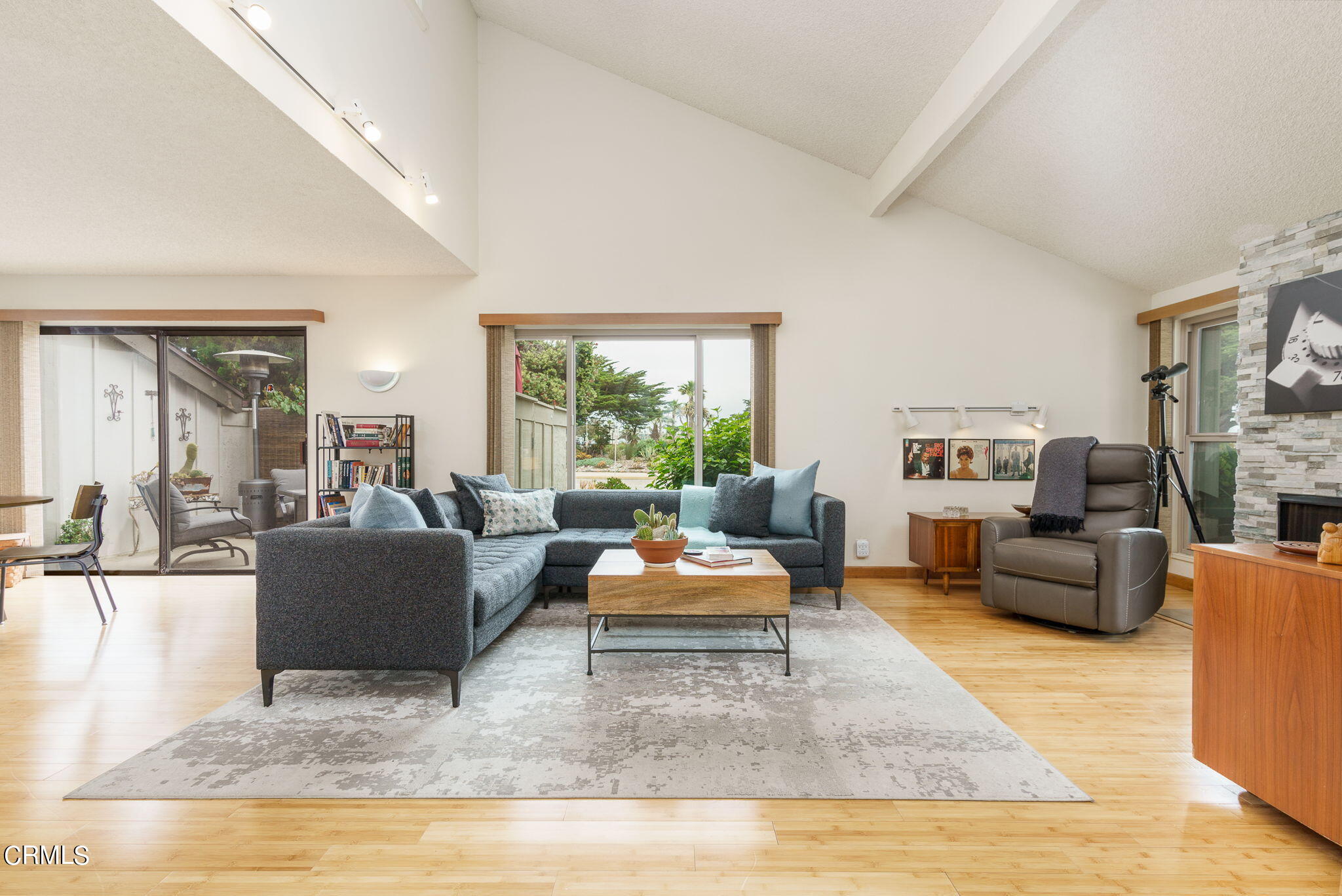 3225 Harbor Boulevard Oxnard, CA 93035 - Photo 7 of 34 a living room with furniture and a large window
