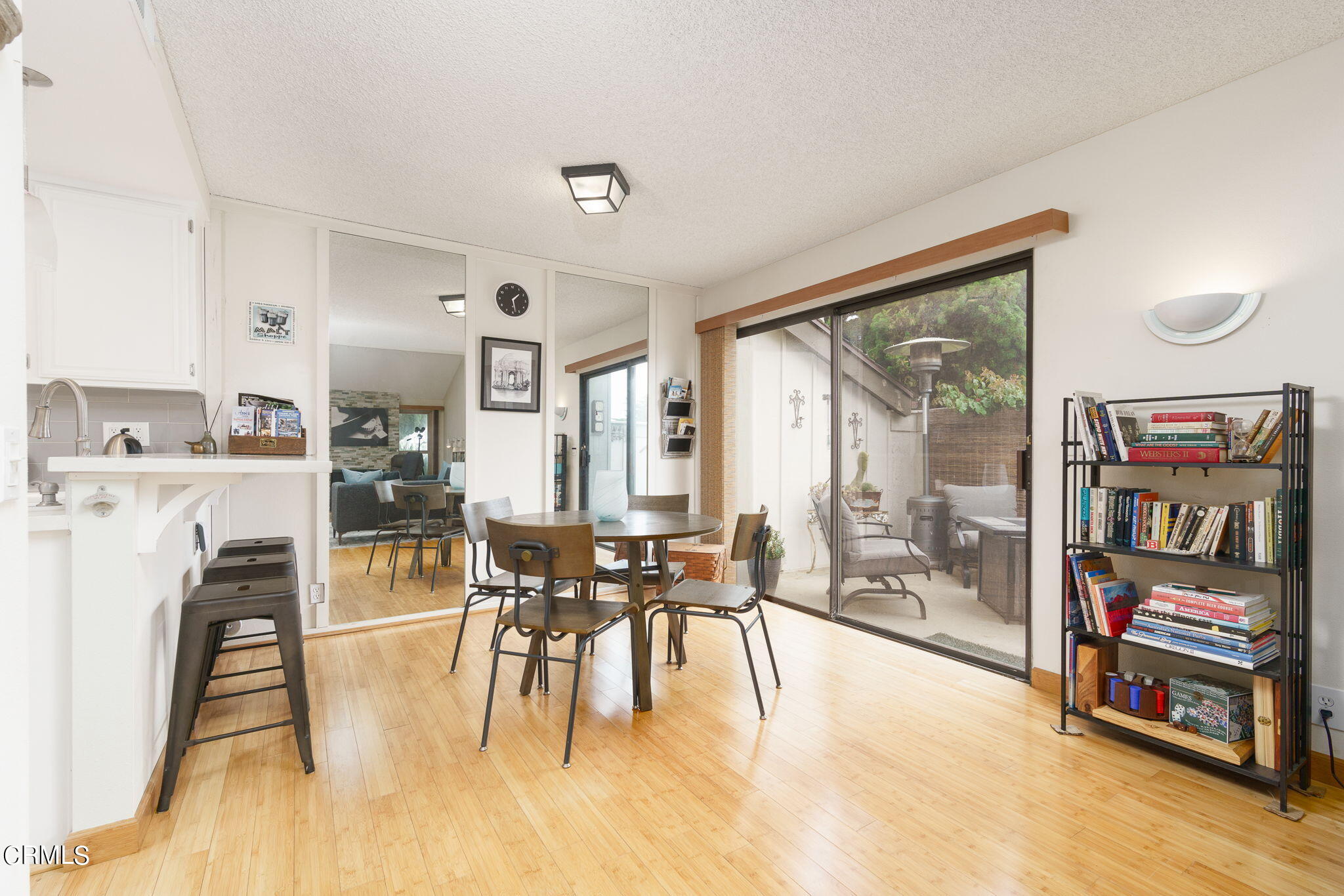 3225 Harbor Boulevard Oxnard, CA 93035 - Photo 9 of 34 a living room with furniture and a flat screen tv