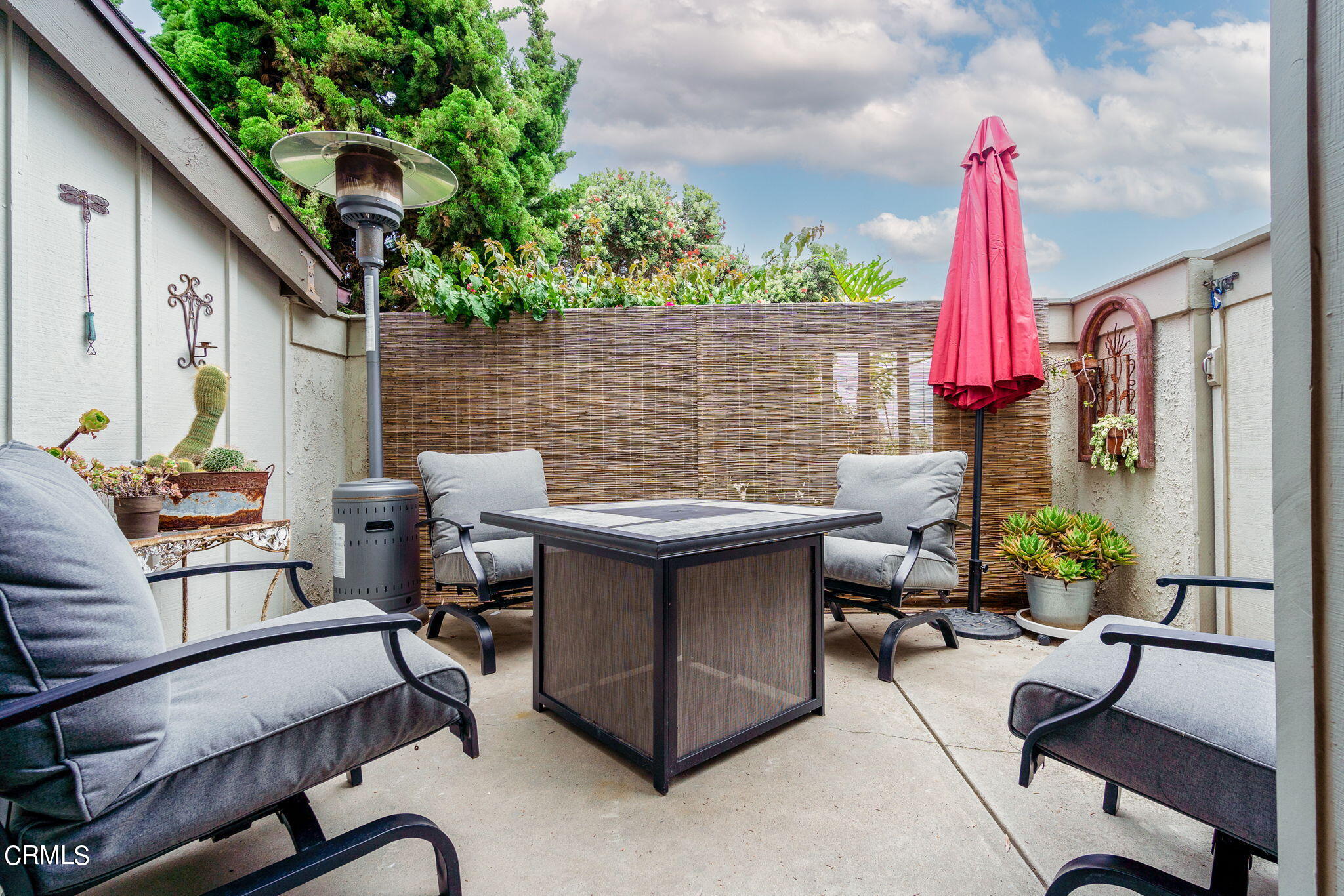 3225 Harbor Boulevard Oxnard, CA 93035 - Photo 10 of 34 a view of a patio with a table and chairs