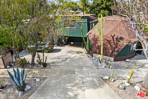 a car parked in front of a house