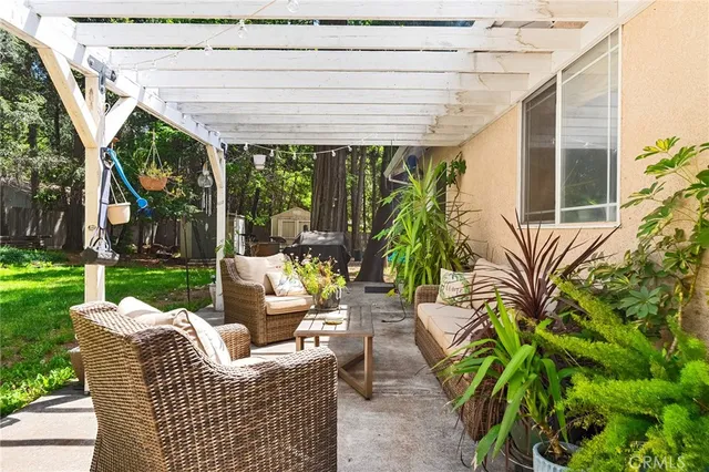 a view of outdoor dining space with a patio