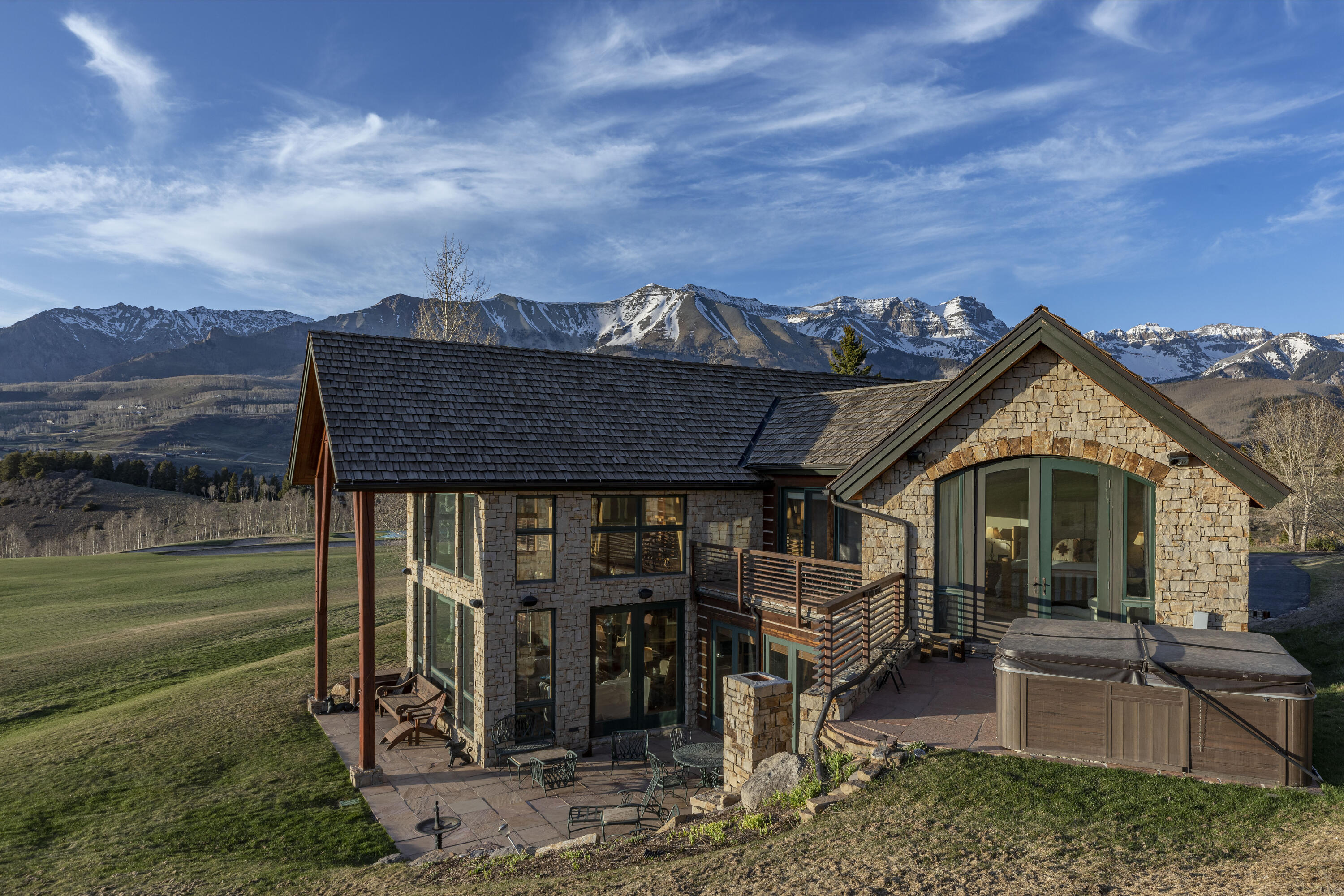 151 Adams Ranch Road Mountain Village, CO 81435 - Photo 3 of 38 a view of a house with a yard balcony and entertaining space