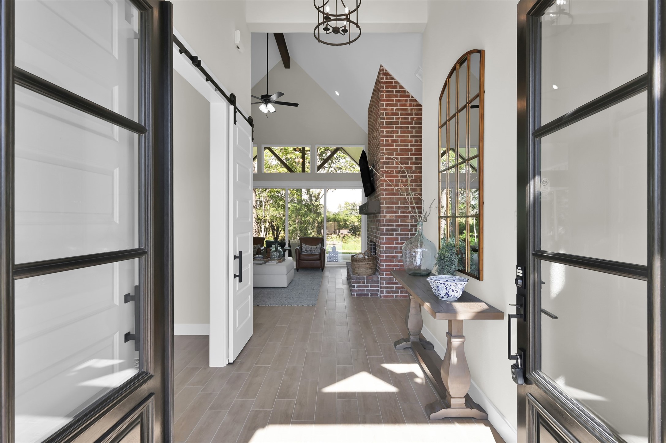 8557 Butler Rnch Court Plantersville, TX 77363 - Photo 4 of 39 warm and bright entry from the double glass doors