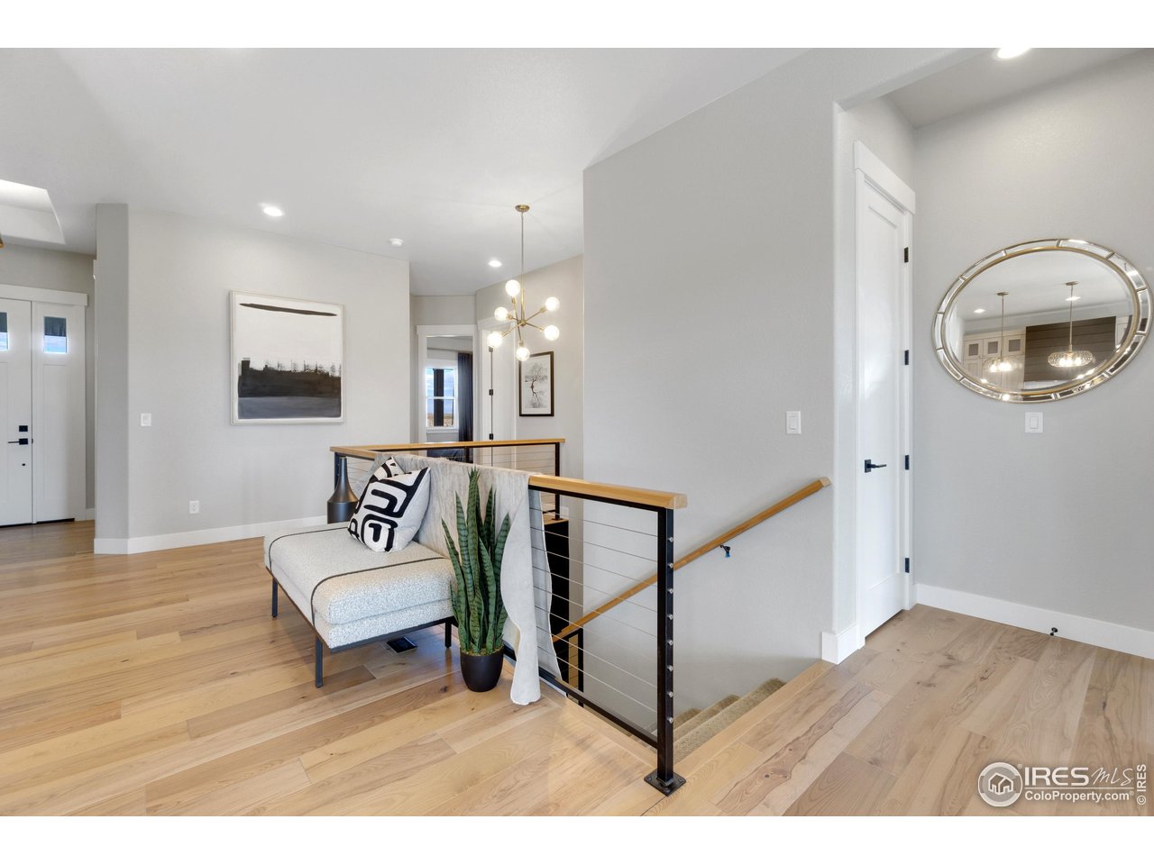 2039 Morningstar Way Fort Collins, CO 80524 - Photo 5 of 34 Welcoming Entry with Beautiful Engineered Hardwood Flooring