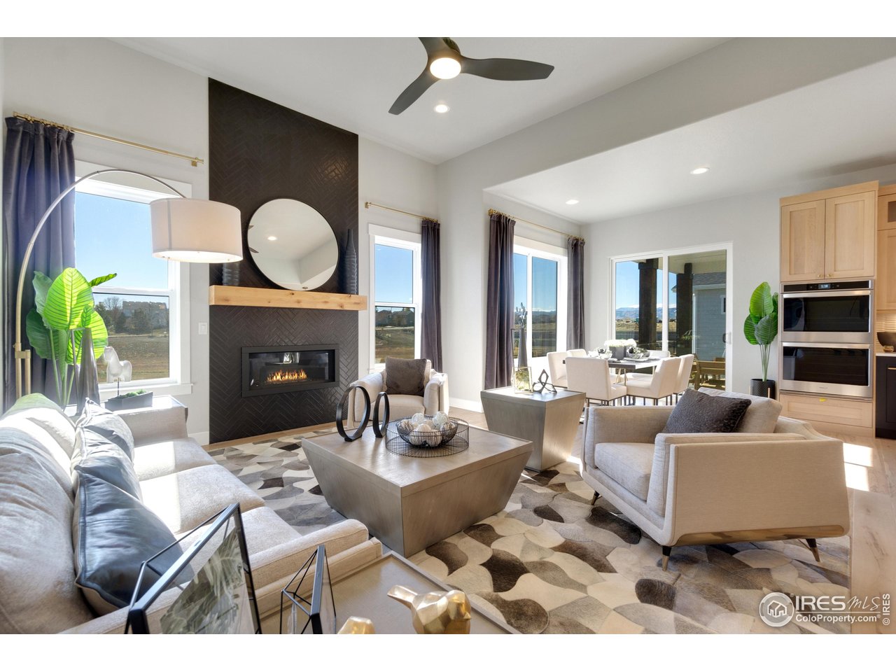 2039 Morningstar Way Fort Collins, CO 80524 - Photo 8 of 34 Relax by the Gas Fireplace with Tile to Ceiling!