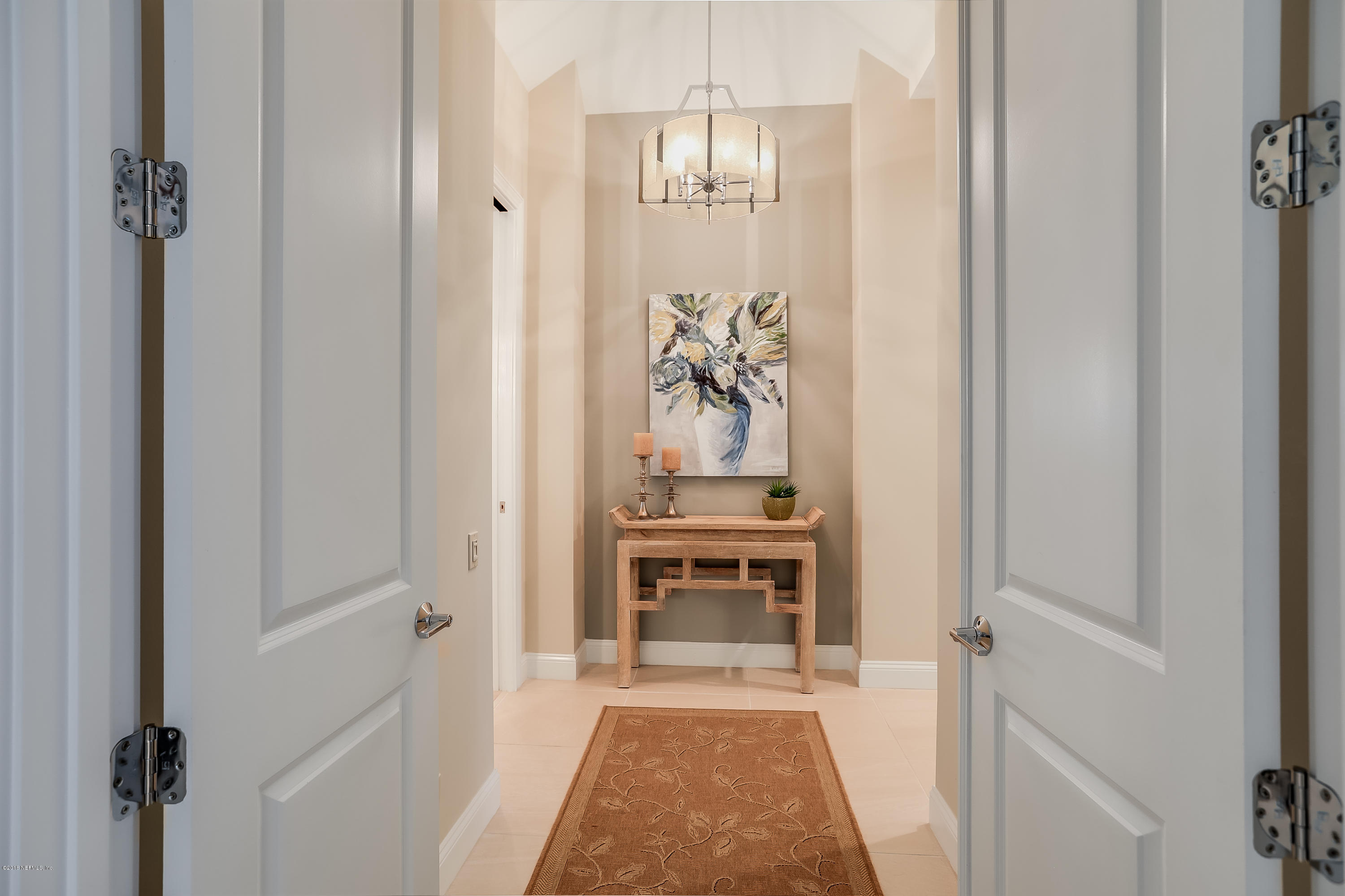 68 Costa Del Sol Drive St. Augustine, FL 32095 - Photo 17 of 55 a view of a livingroom with furniture and windows