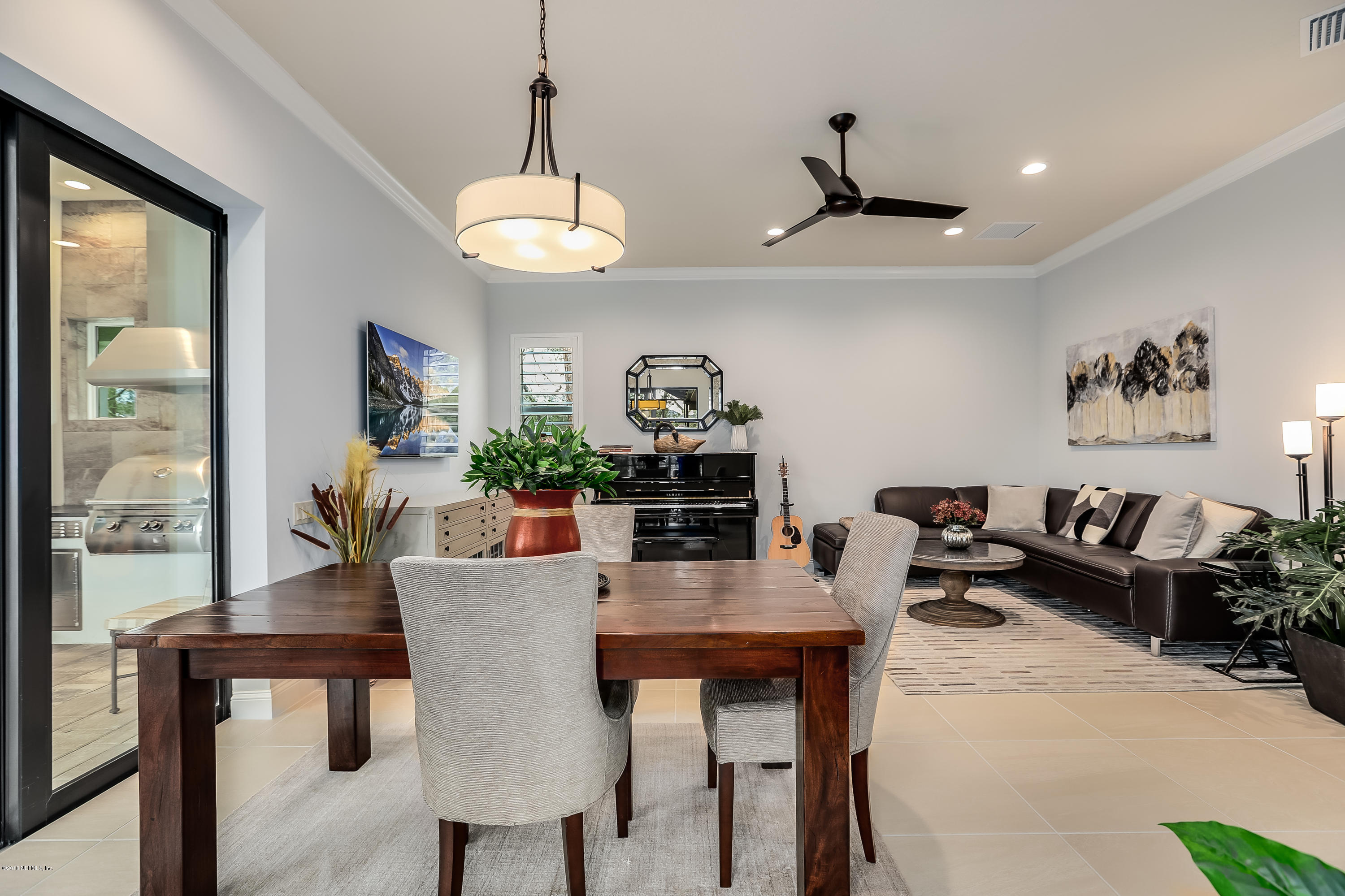 68 Costa Del Sol Drive St. Augustine, FL 32095 - Photo 23 of 55 a view of a dining room with furniture window and outside view