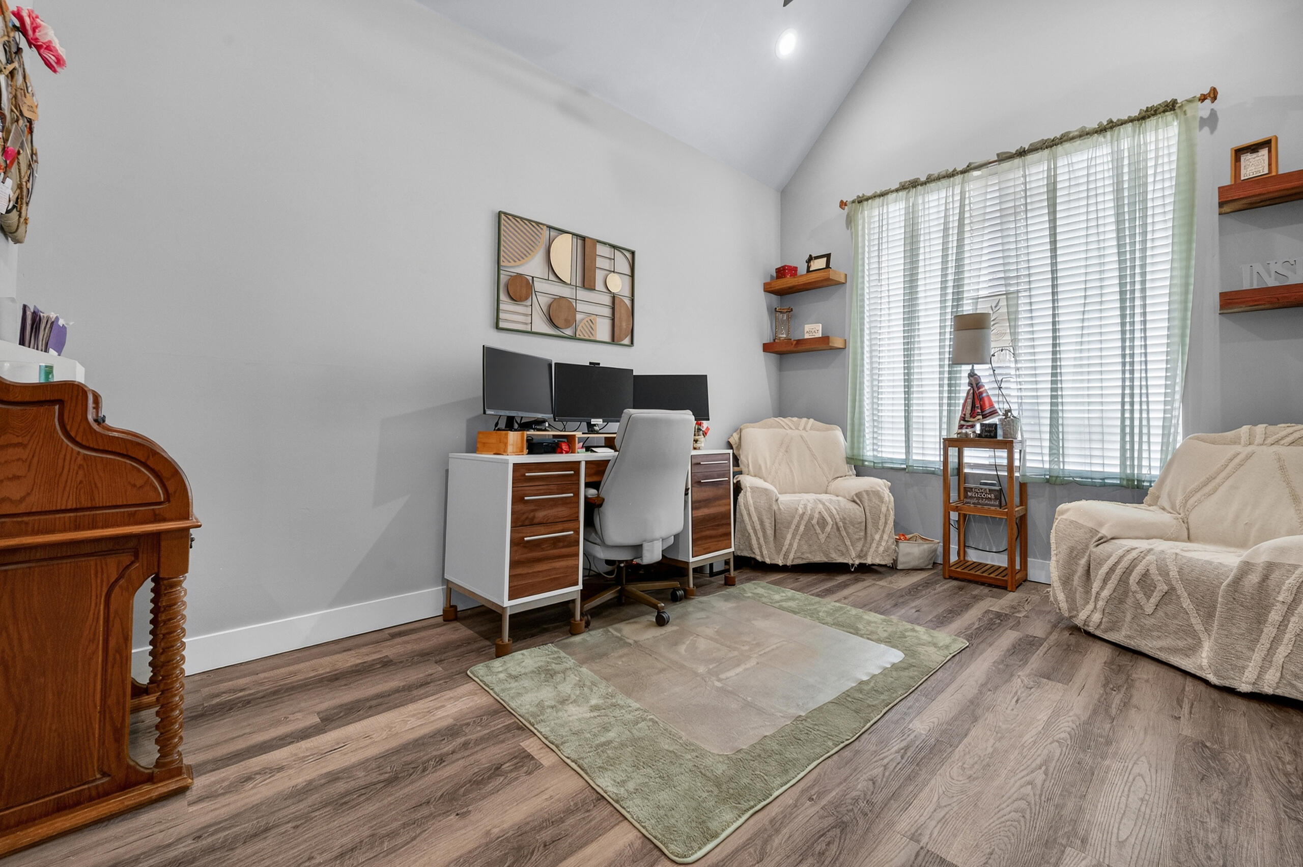 11211 Grover Avenue Lubbock, TX 79424 - Photo 23 of 43 a bedroom with furniture and a window