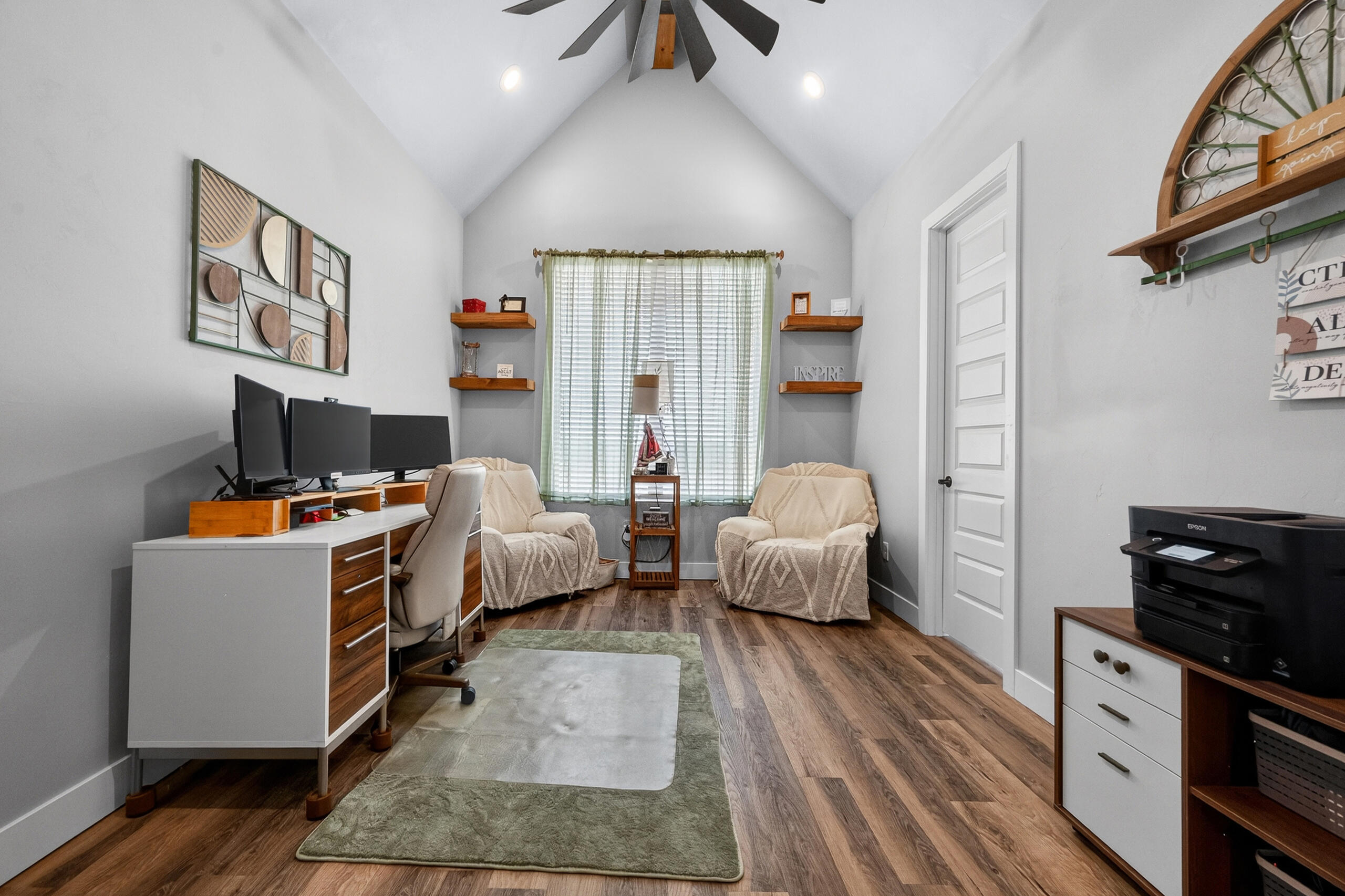 11211 Grover Avenue Lubbock, TX 79424 - Photo 24 of 43 a bedroom with furniture and a wooden floor