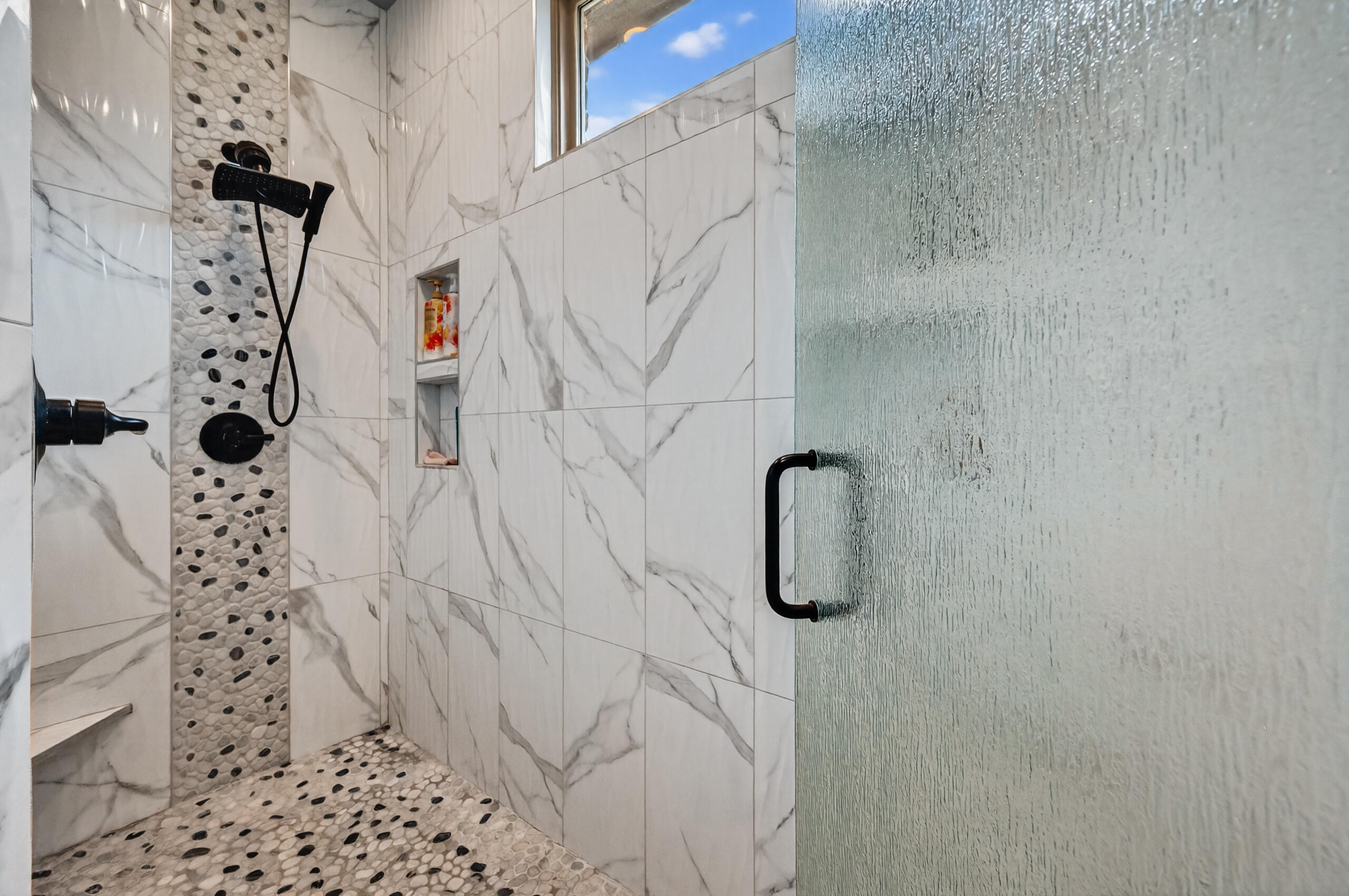 11211 Grover Avenue Lubbock, TX 79424 - Photo 34 of 43 a bathroom with a shower
