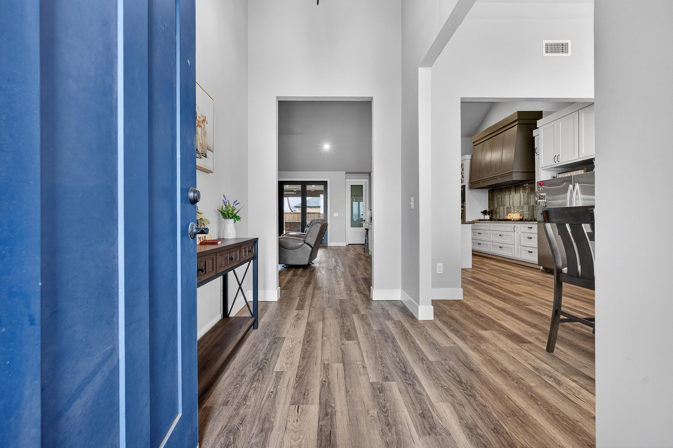 11211 Grover Avenue Lubbock, TX 79424 - Photo 4 of 43 a view of hallway with wooden floor