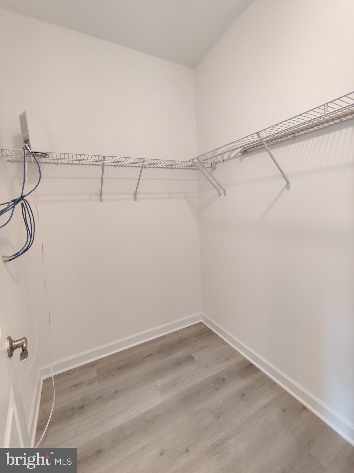 5002 Longmire Way, Unit 70 Chantilly, VA 20151 - Photo 17 of 28 a view of a room with racks on the wall