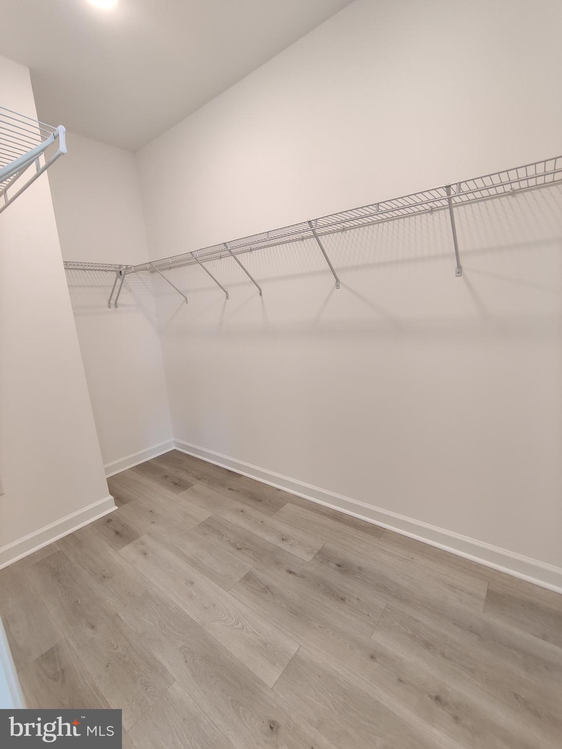5002 Longmire Way, Unit 70 Chantilly, VA 20151 - Photo 18 of 28 a view of a room with racks on the wall