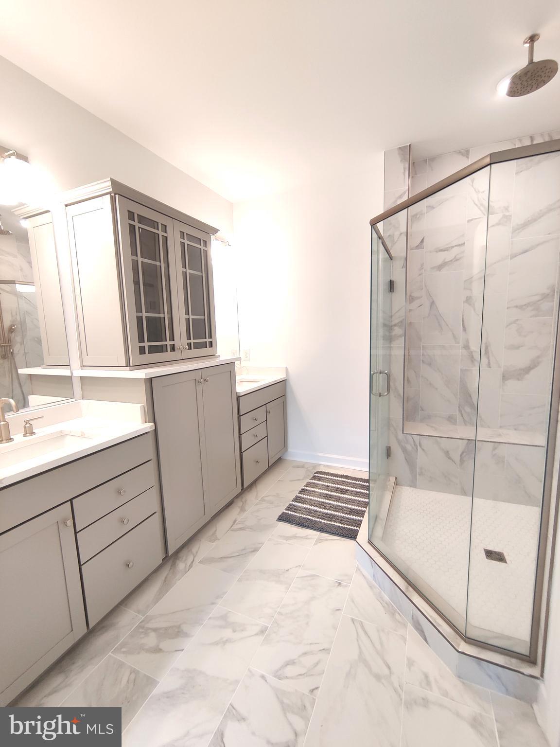 5002 Longmire Way, Unit 70 Chantilly, VA 20151 - Photo 24 of 28 a bathroom with a tub sink and shower