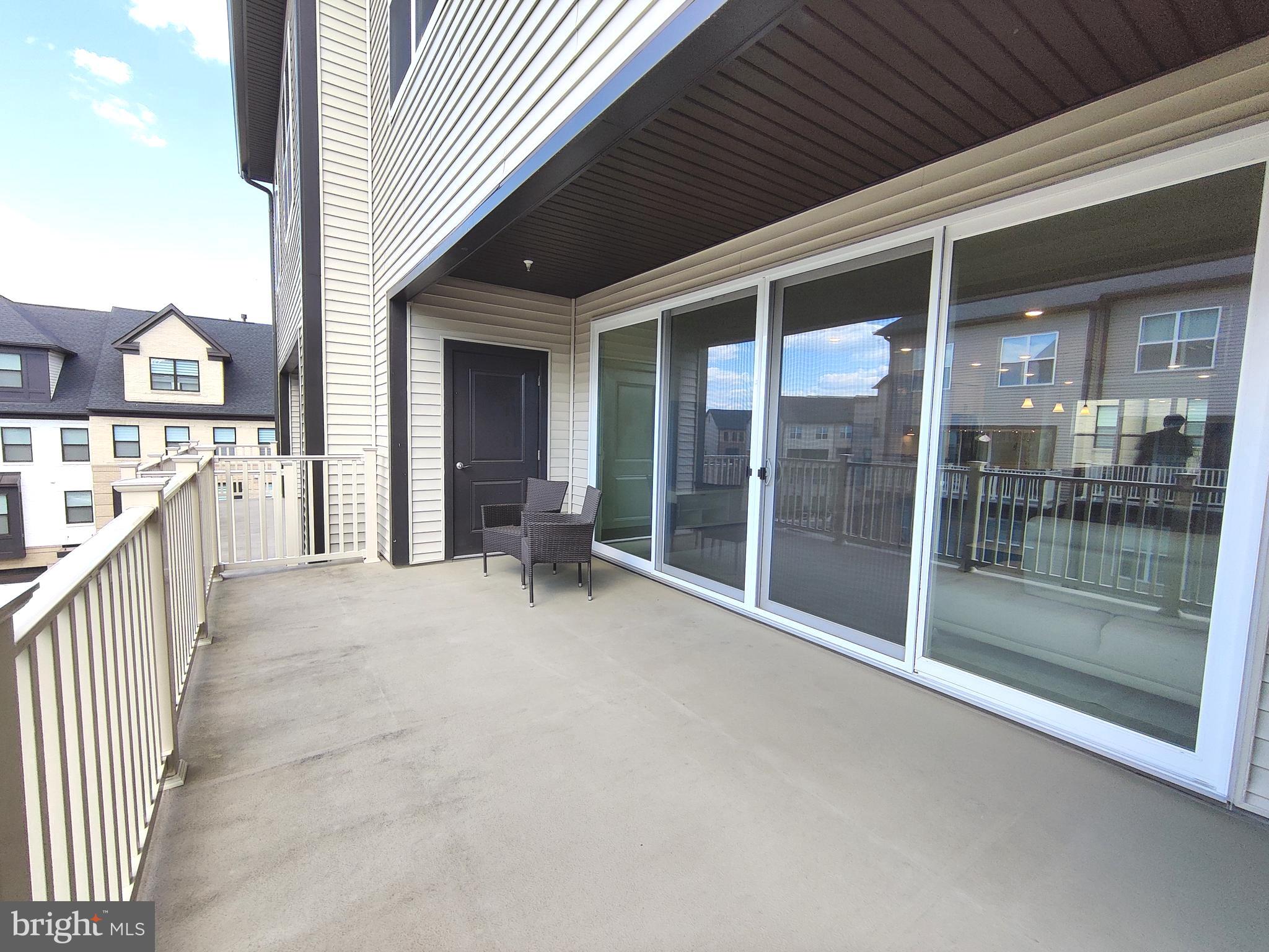 5002 Longmire Way, Unit 70 Chantilly, VA 20151 - Photo 3 of 28 a view of a porch with balcony