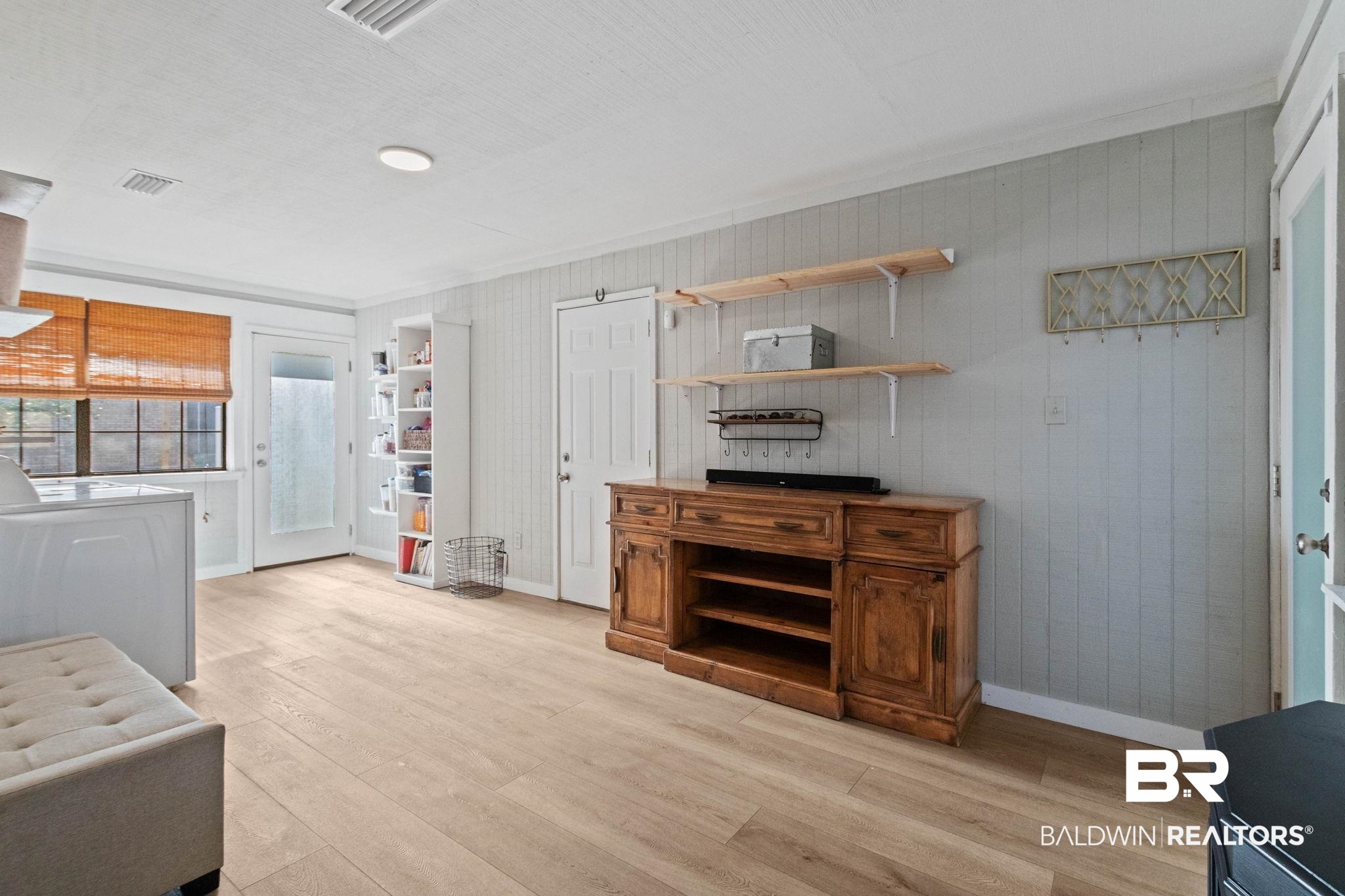 524 Ariel Avenue Foley, AL 36535 - Photo 23 of 37 Light wood-finish flooring extending throughout the space