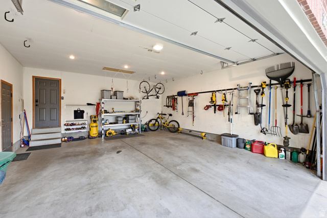 2073 Village Point Way Sandy, UT 84093 - Photo 52 of 68 Spacious garage with lots of storage.
