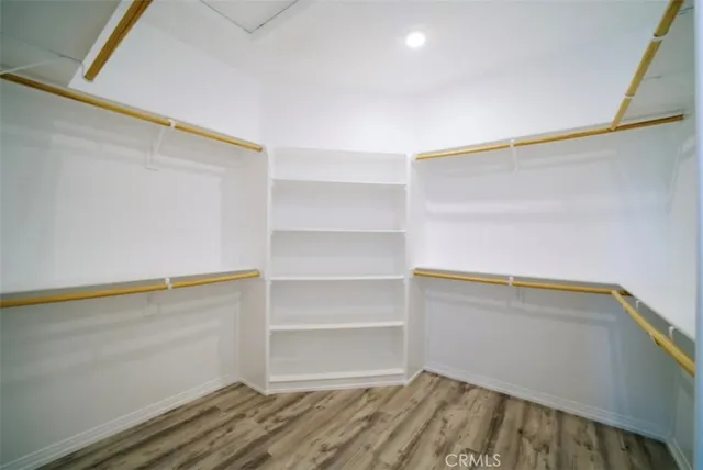 a view of an empty walk in closet