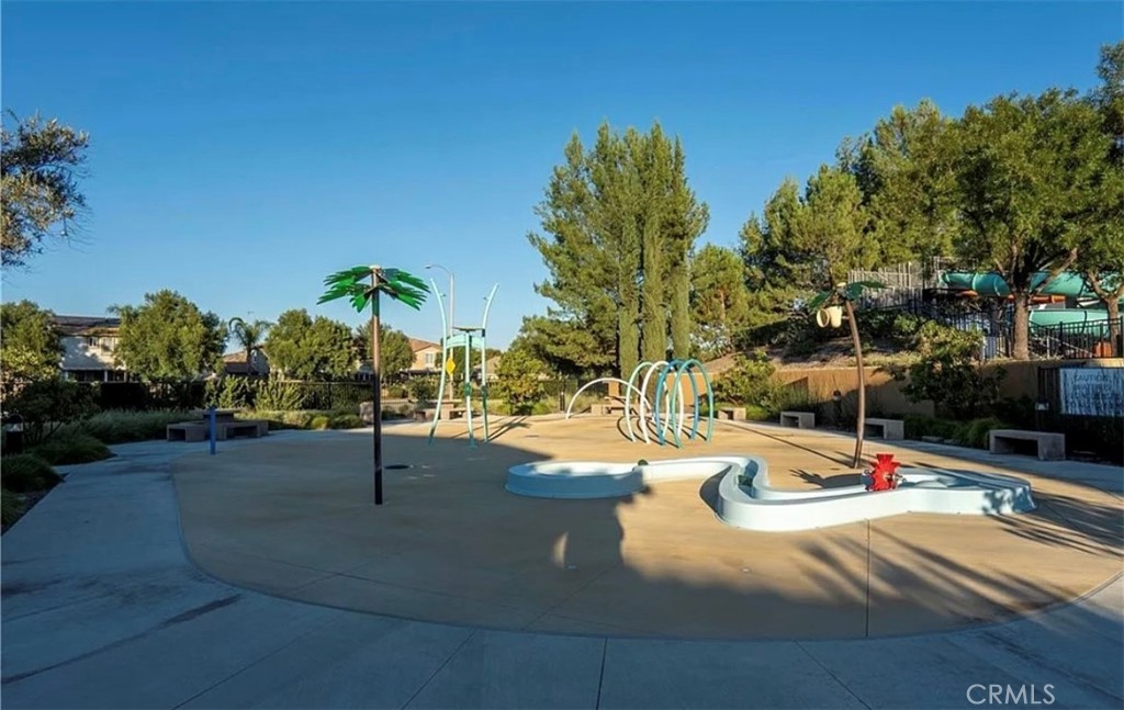 30237 Bristol Gate Lane Menifee, CA 92584 - Photo 28 of 34 a view of a swimming pool with an outdoor seating