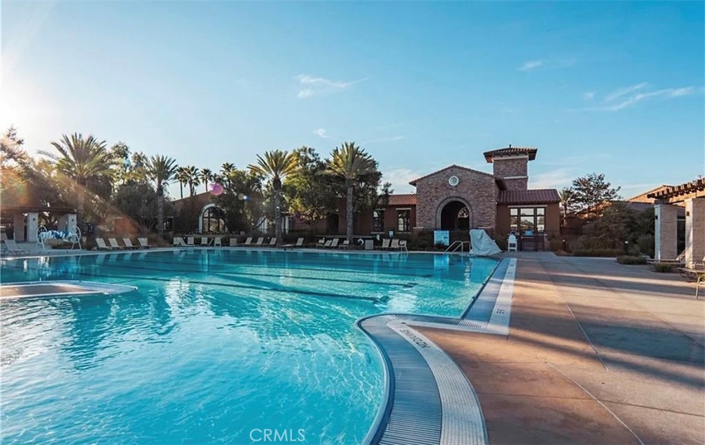 30237 Bristol Gate Lane Menifee, CA 92584 - Photo 30 of 34 a front view of a house with a yard