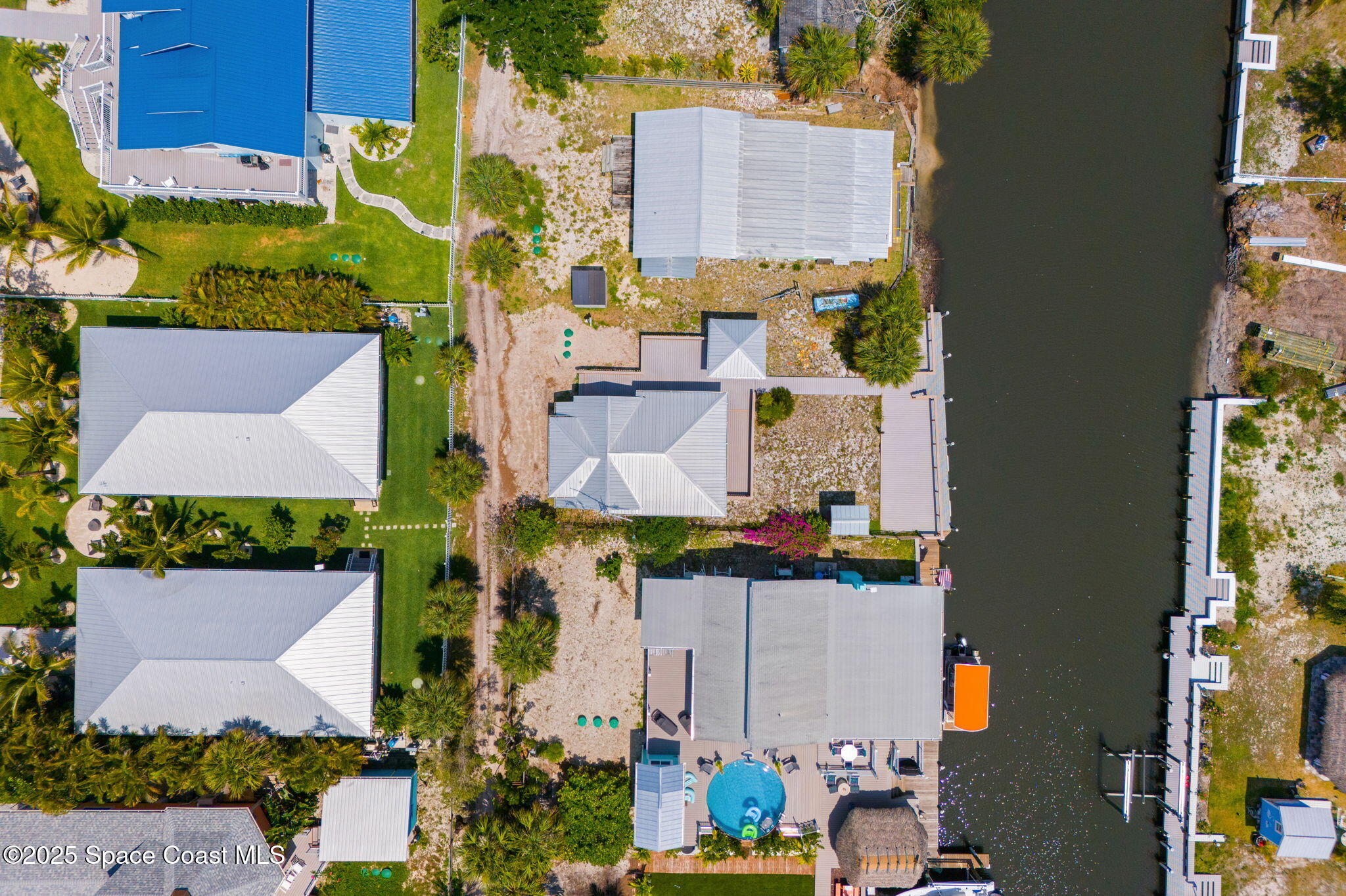 36 Vip Island, Unit A Grant, FL 32949 - Photo 43 of 63 an aerial view of houses with outdoor space