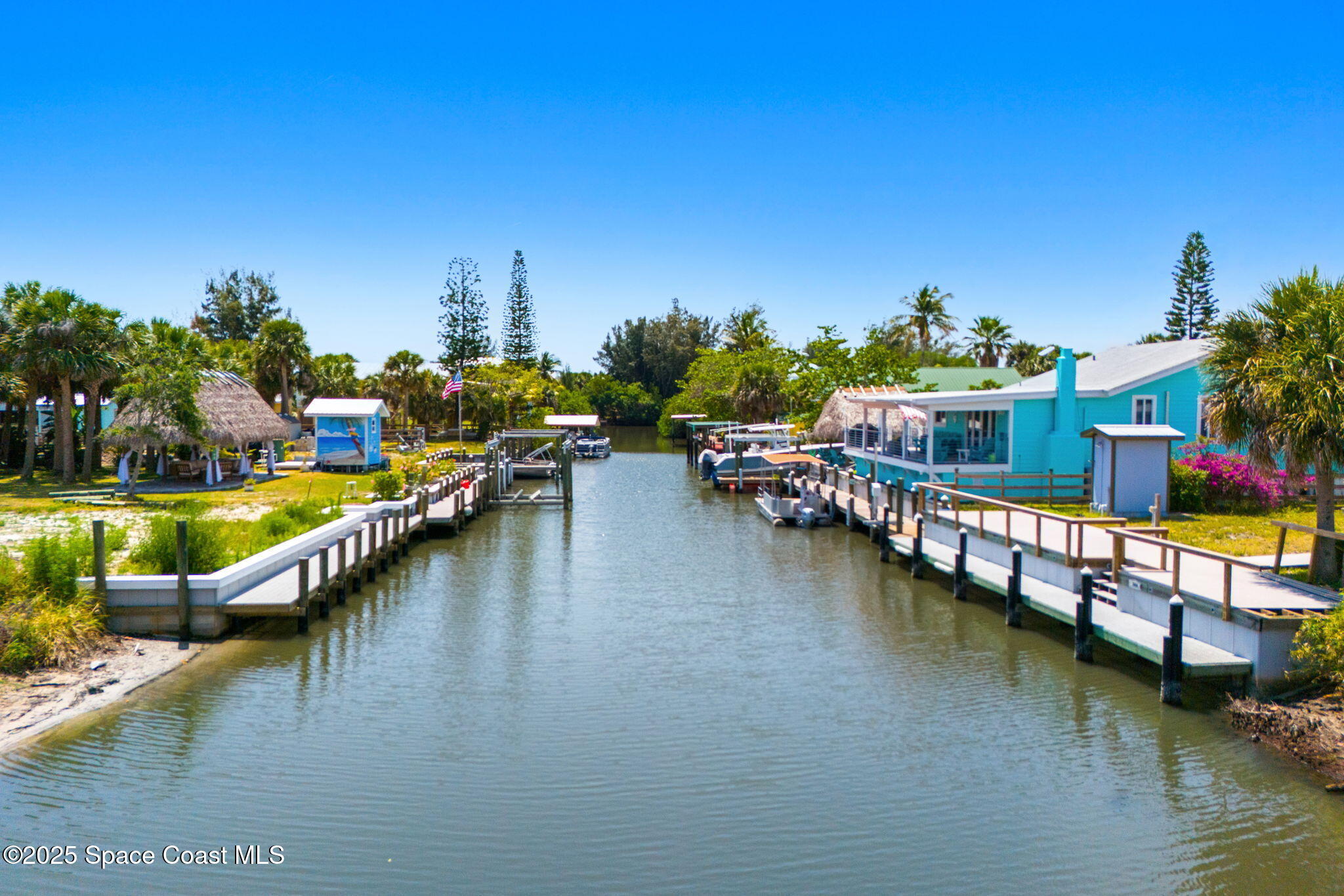 36 Vip Island, Unit A Grant, FL 32949 - Photo 47 of 63 a view of a swimming pool with outdoor seating