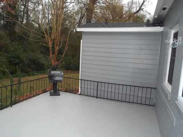 a view of a garden with a bench