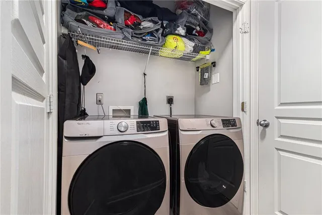 a utility room with dryer and washer