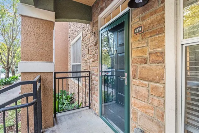 a front view of a house with a glass door