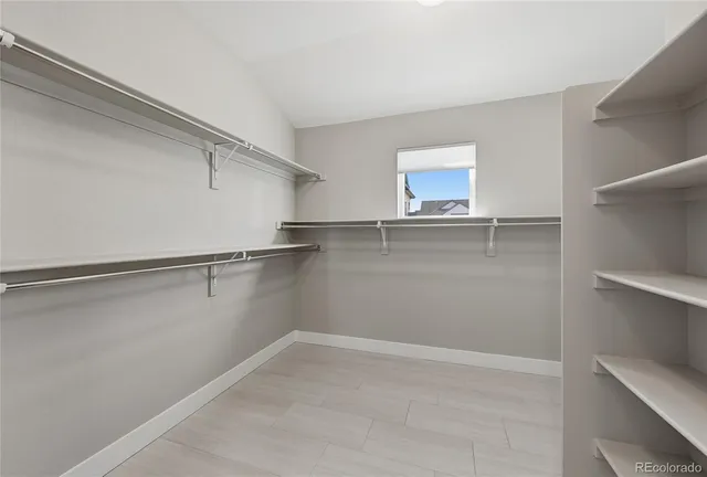 a view of an empty walk in closet