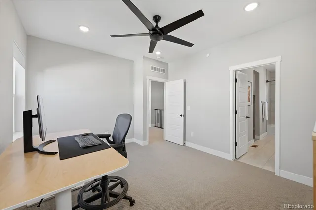 a workspace with chandelier