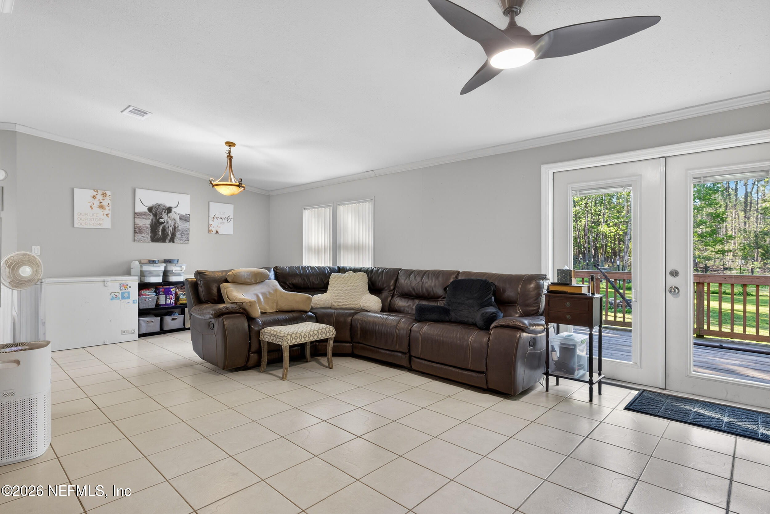 1755 Bennett Road St. Augustine, FL 32092 - Photo 12 of 34 a living room with furniture and a window