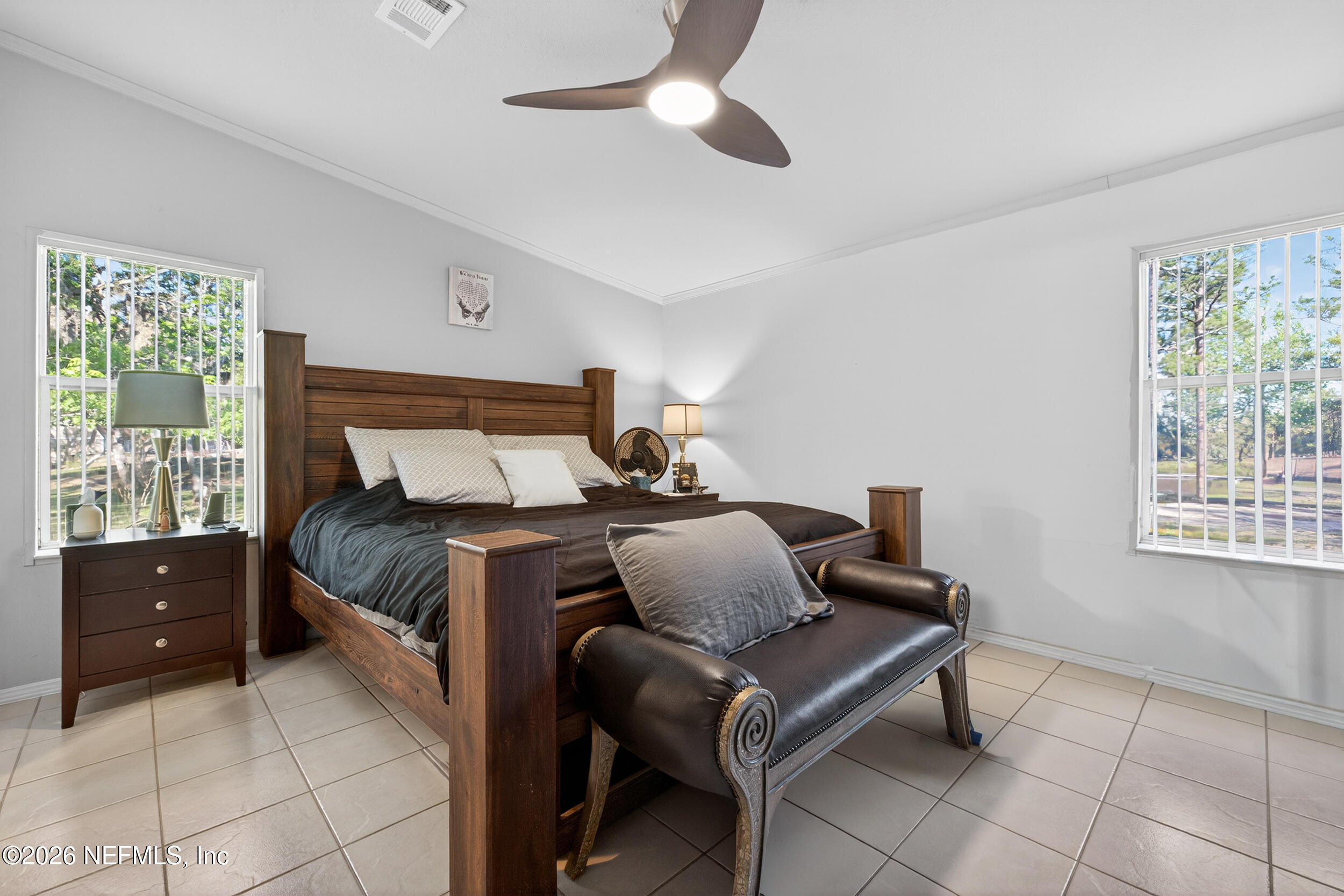 1755 Bennett Road St. Augustine, FL 32092 - Photo 16 of 34 a bedroom with a bed and window