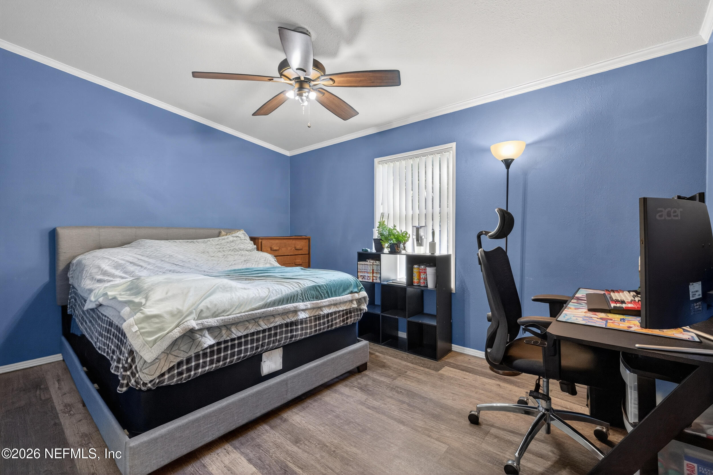 1755 Bennett Road St. Augustine, FL 32092 - Photo 20 of 34 a bedroom with a bed a computer on a desk and chair