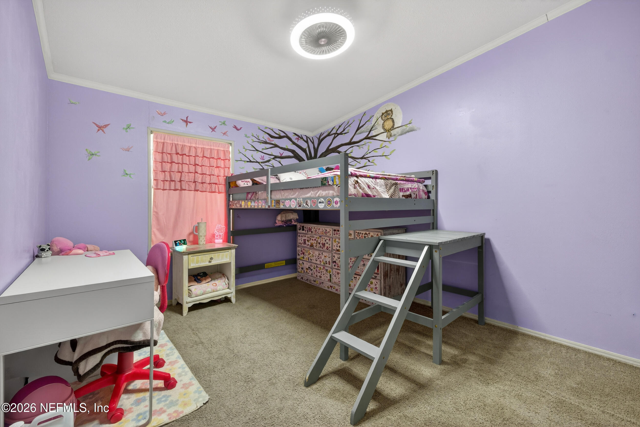 1755 Bennett Road St. Augustine, FL 32092 - Photo 21 of 34 a bedroom with furniture and a chair