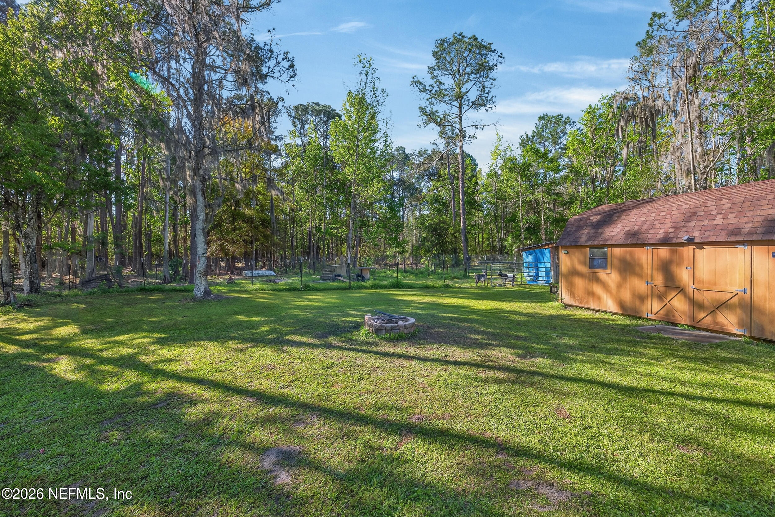1755 Bennett Road St. Augustine, FL 32092 - Photo 26 of 34 a view of a house with a big yard